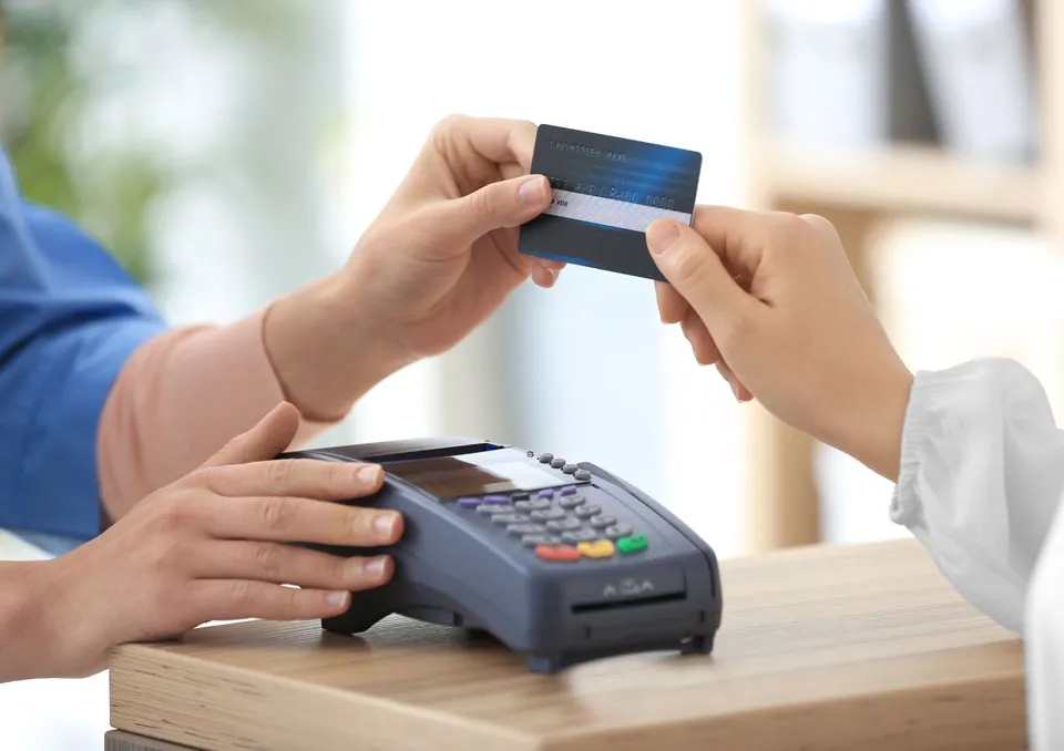 patient paying for dental procedures